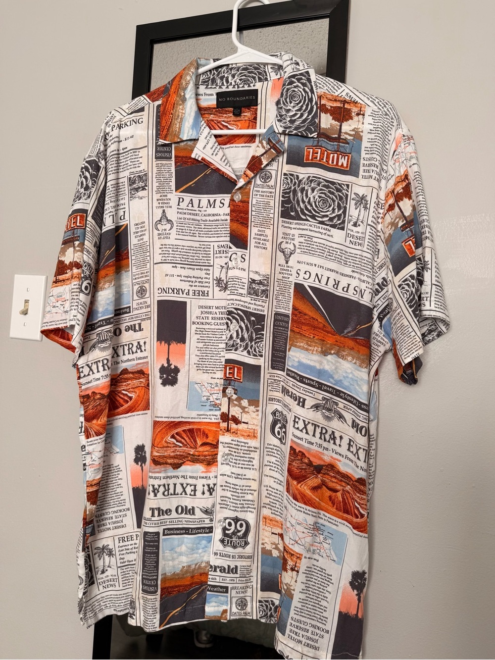 NEW WITHOUT TAG! 
No Boundaries Men's Newsprint Button-Up Shirt.